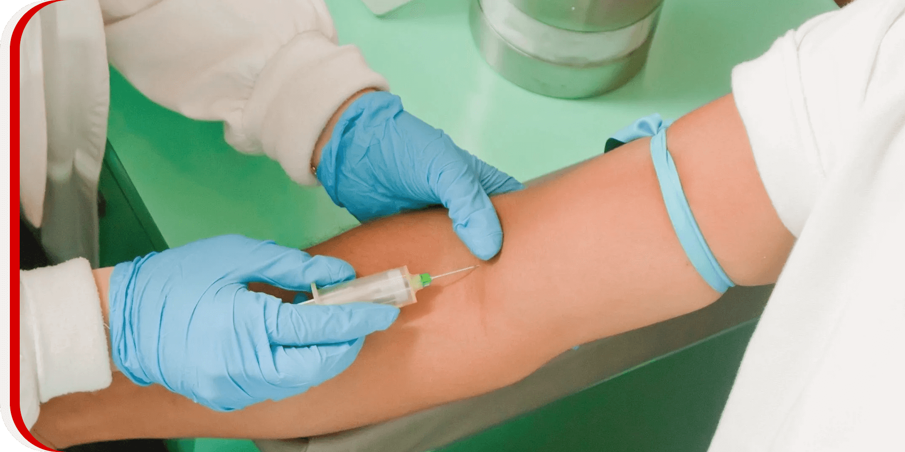 A person is getting an injection in his arm.